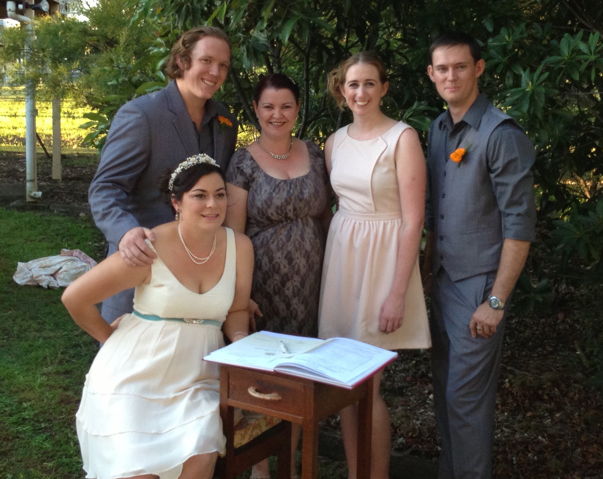 Signing the marriage certificates and register!